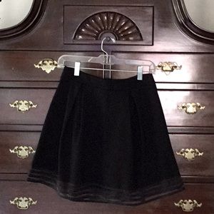 Black, Full Skirt With Rib Laced Hem.